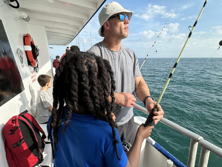 Mike Alstott Family Foundation Teams Up wit A Reel Future to host Holiday Fishing Party for Foster Children